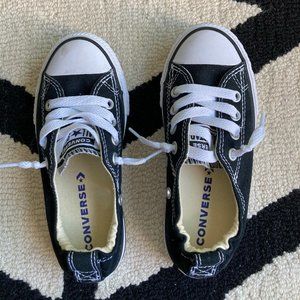 Black low top slip-on Converse for kids